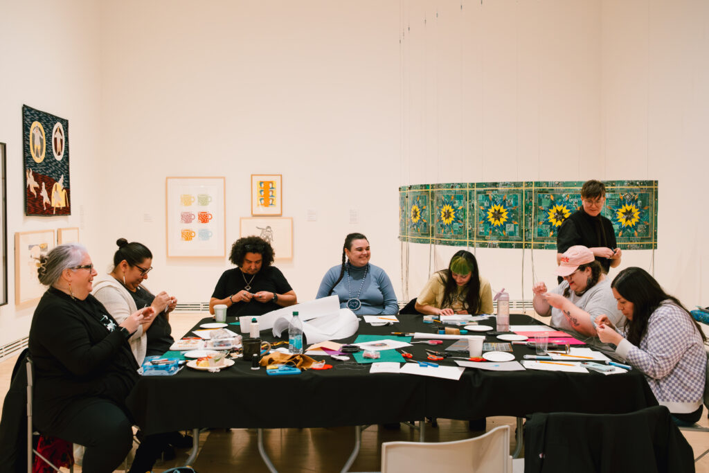 Indigenous beading circle in the gallery